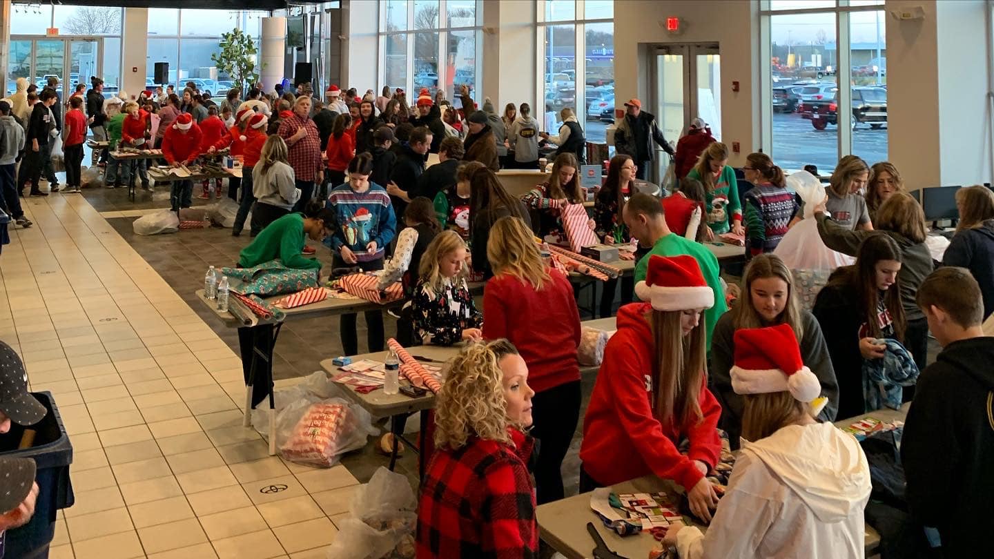 People wrapping presents